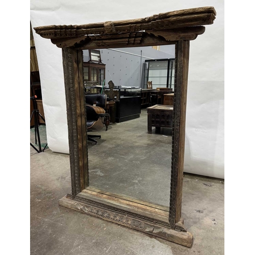 270 - A Nepalese carved wooden window frame salvaged from a noble or royal palace, Kathmandu Valley, 17th ... 