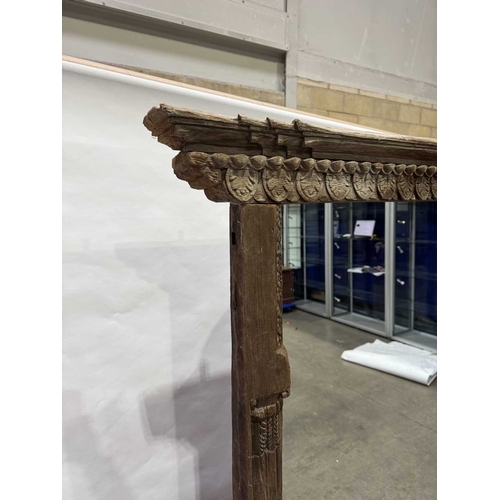 272 - A Nepalese carved wooden window frame salvaged from a noble or royal palace, Kathmandu Valley, 18th ... 
