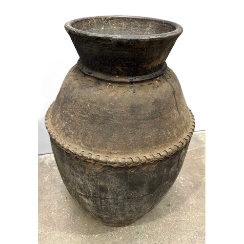 273 - A large Newari hand-built earthenware vessel or 'Ghyampo' rice container, 18th century, flared rim a... 