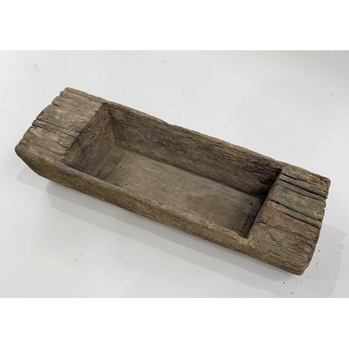 276 - A 19th century Nepalese dowry box and lid, leather over a cane structure, iron fastenings, h:48, w:5... 