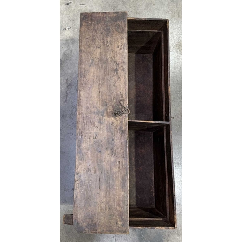 280 - A wooden two plank grain store, Tamang, North West Nepal, the chest ornamented with a relief grid bo... 