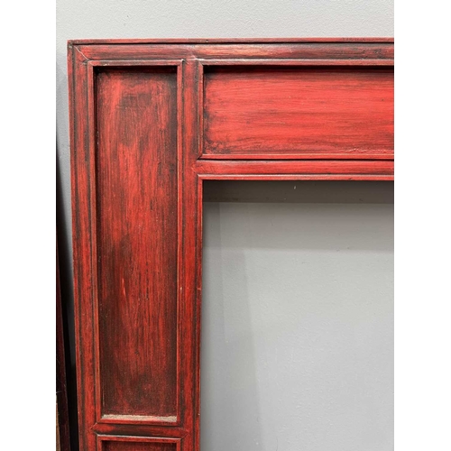 285 - A contemporary Tibetan mirror, panelled wood frame painted with floral motifs, 102 by 102cm, togethe... 