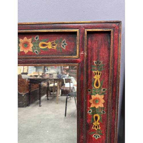 285 - A contemporary Tibetan mirror, panelled wood frame painted with floral motifs, 102 by 102cm, togethe... 