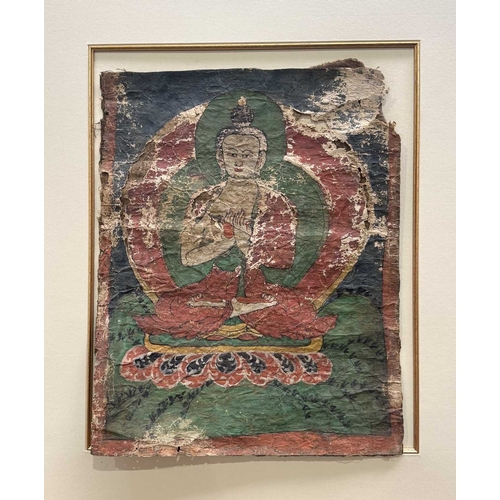 288 - A Tibetan thangka painting of the Vairocana Buddha, 17th century, shown seated on a lotus throne hol... 