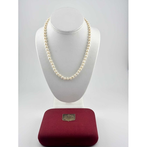 336 - A cultured pearl necklace, clasp stamped 585