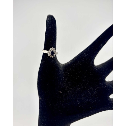 414 - A pear-shape sapphire and single-cut diamond cluster ring, estimated total diamond weight 0.25ct, st... 