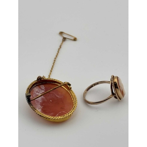 428 - A 9ct gold cameo ring and brooch, ring with hallmarks for Birmingham 1971, ring size M, brooch stamp... 
