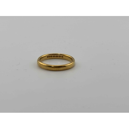 430 - A mid 20th century 22ct gold band ring, hallmarks for Birmingham 1957, ring N, width 3mm, 4g.