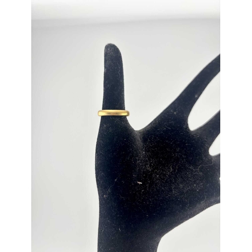 435 - A 22ct gold band ring, weight 4.1grams (1)