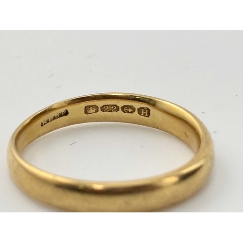 435 - A 22ct gold band ring, weight 4.1grams (1)
