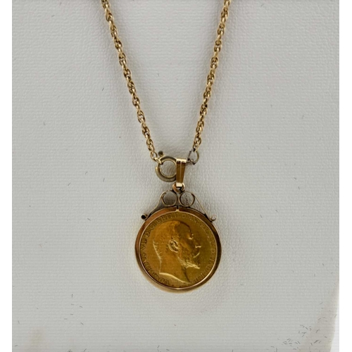 438 - A 9ct gold mounted half sovereign pendant, with chain, pendant mount with hallmarks for London 1962,... 