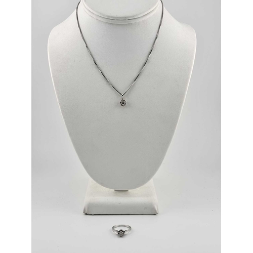 440 - A diamond ring and diamond pendant and chain, marks to the inside of the ring 'LAD 510', indistinct ... 