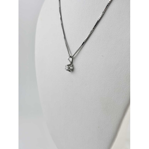 440 - A diamond ring and diamond pendant and chain, marks to the inside of the ring 'LAD 510', indistinct ... 