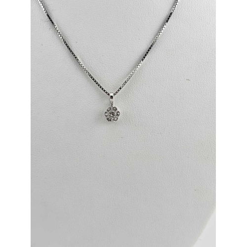 440 - A diamond ring and diamond pendant and chain, marks to the inside of the ring 'LAD 510', indistinct ... 