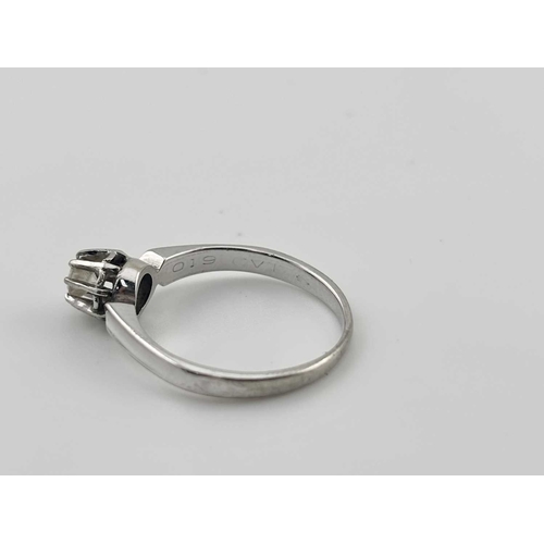 440 - A diamond ring and diamond pendant and chain, marks to the inside of the ring 'LAD 510', indistinct ... 