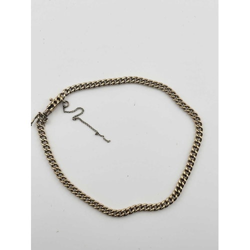 441 - A gold-coloured metal chain link bracelet, security fastening with keeper, gross weight 8 grams (1)