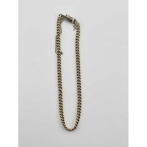 441 - A gold-coloured metal chain link bracelet, security fastening with keeper, gross weight 8 grams (1)