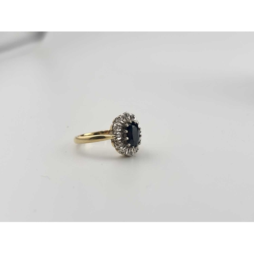 442 - A gold coloured metal sapphire and diamond cluster rings marked 18CT, gross weight 4.6g (1)