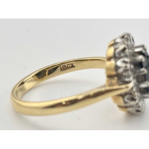 442 - A gold coloured metal sapphire and diamond cluster rings marked 18CT, gross weight 4.6g (1)
