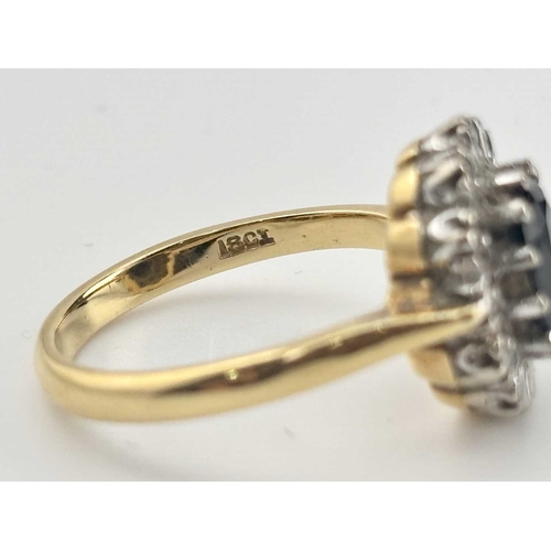 442 - A gold coloured metal sapphire and diamond cluster rings marked 18CT, gross weight 4.6g (1)