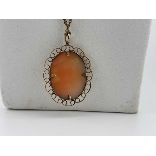 450 - A cameo pendant and chain, both stamped 375, length of pendant 4.5cm, length of chain 61cm, 13.9g.