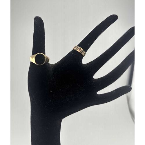 452 - Two late Victorian 15ct gold rings, to include a signet ring with missing gem, and a ring set with t... 
