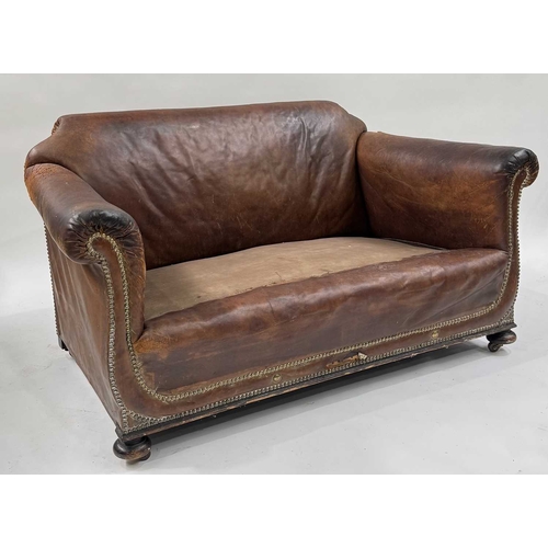 542 - An art deco brown leather three piece suite, low slung and deep seated, lyre shaped arms, with brass... 