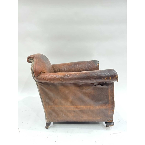 542 - An art deco brown leather three piece suite, low slung and deep seated, lyre shaped arms, with brass... 