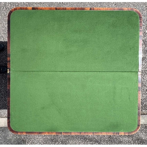 545 - A mid 19th century rosewood foldover games table, central column sitting on acanthus carved support,... 