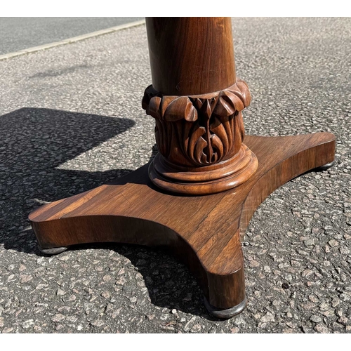 545 - A mid 19th century rosewood foldover games table, central column sitting on acanthus carved support,... 
