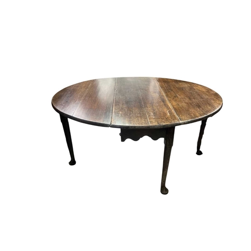 546 - Two Georgian dining tables, a mahogany gate leg table with oval leaves, slim tapering legs to pad fe... 