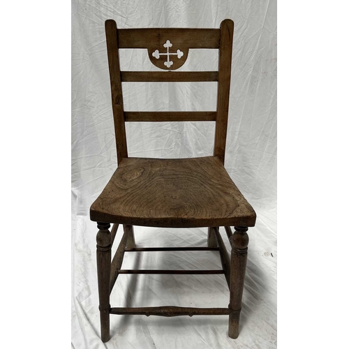 549A - A pair of beech and elm chairs, 19th century, possibly from a church, the top rails carved with cros... 