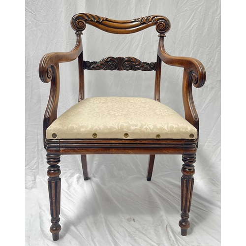 550 - A regency mahogany armchair, scrolling top rail, carved splat, arms terminating in scrolls, drop in ... 