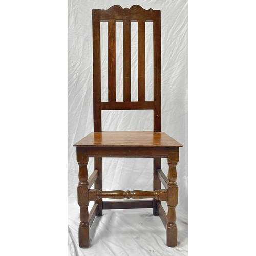 550 - A regency mahogany armchair, scrolling top rail, carved splat, arms terminating in scrolls, drop in ... 