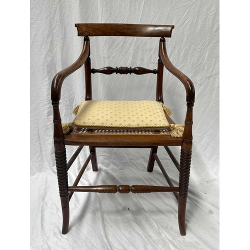 550 - A regency mahogany armchair, scrolling top rail, carved splat, arms terminating in scrolls, drop in ... 