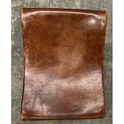 552 - A Spanish wood and leather x-frame stool, 20th century, Probably by Pierre Lottier for Valmazan, uph... 