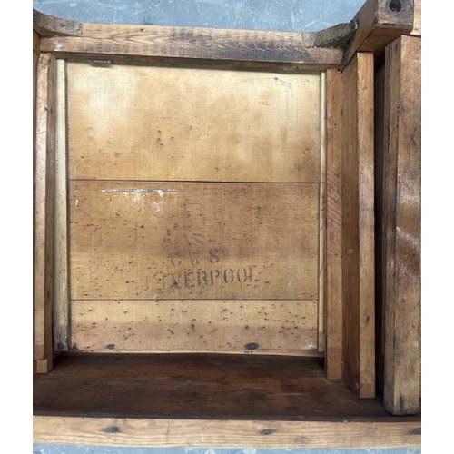 553 - An oak ottoman or blanket box, over stuffed padded top, opening to storage, heavily carved panels to... 