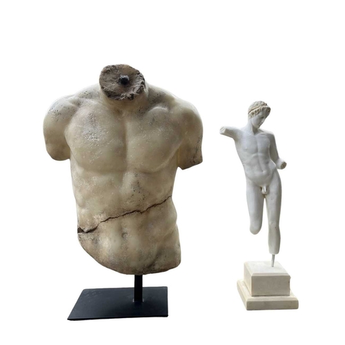 556 - A marble dust resin torso of a male nude after the 'Discophorus' / 'Discophoros' torso from antiquit... 
