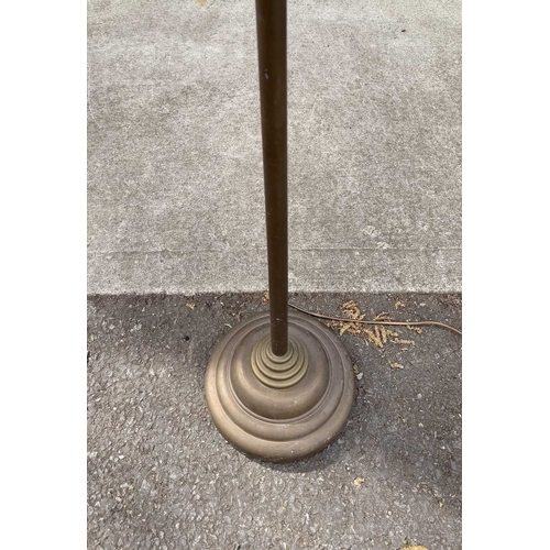 566A - A Laura Ashley brushed brass standard lamp, conical shade with adjustable neck, down to stepped weig... 