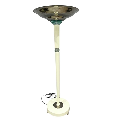 569 - An Art Deco/ Post Modern style floor standing uplighter in an ivory colour on metal with fin type ci... 