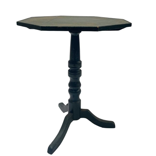 582 - An octagonal topped tripod table, oak painted green on turned column to three splayed feet, height a... 