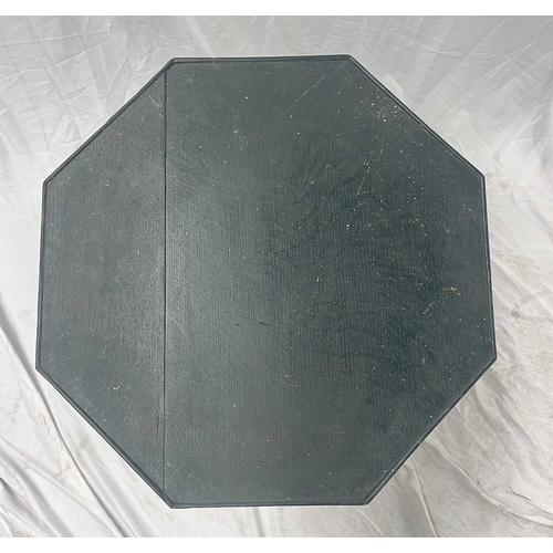 582 - An octagonal topped tripod table, oak painted green on turned column to three splayed feet, height a... 