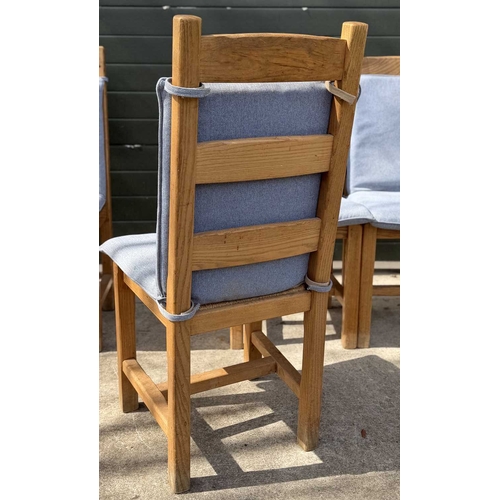 593 - A set of six modern oak dining chairs, ladder backs with drop in rush seats, square legs, detachable... 