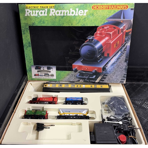 64 - Two Hornby electric train sets to include 'The Rural Rambler' and 'The Country Local' also to includ... 