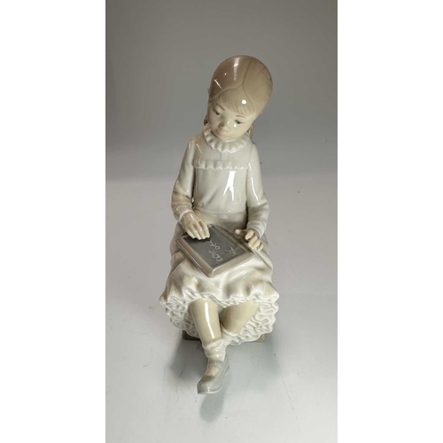 75 - Five Lladro/Nao figurines, including Bunny Girl, the largest 30cm high (5)