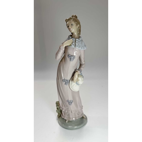 75 - Five Lladro/Nao figurines, including Bunny Girl, the largest 30cm high (5)