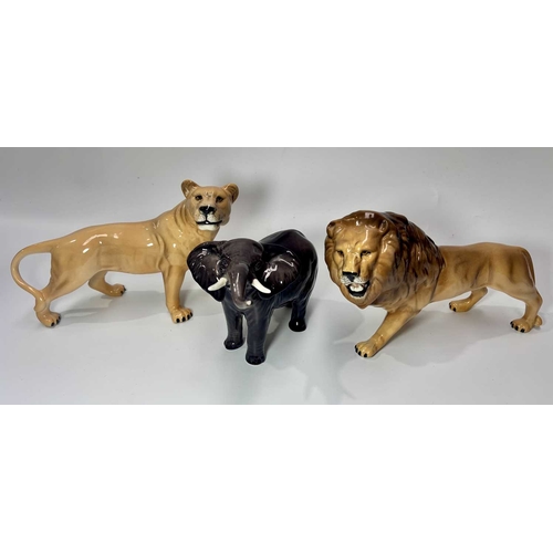 81 - A Beswick ceramic lion, height approx 13.5cm, together with a lioness, height 14cm and an elephant (... 