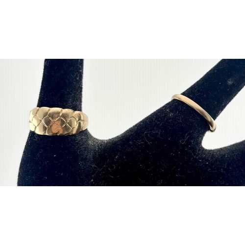 425 - Two rings, to include an early 20th century 18ct gold ring, ring size V, 5.7g, together with a 9ct b... 
