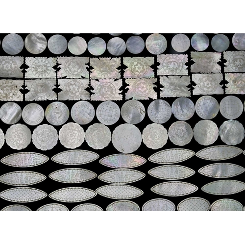 116 - A large collection of Chinese mother of pearl gaming counters, of various shapes and sizes, in part ... 