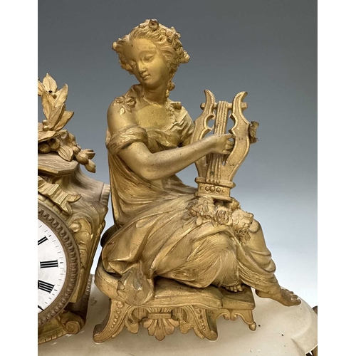 272 - A French mantle clock, 19th century, alabaster base surmounted with a finely cast and gilded female ... 